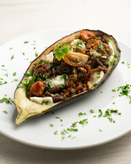 Eggplant tapa stuffed with beef and mozzarella. Traditional recipe of Spanish gastronomy.