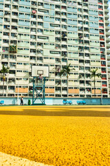HONG KONG - 30TH DECEMBER 2023 A basketball court and colourful facades and architecture in...