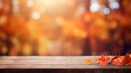 Naklejka na ściany i meble Empty wooden table with autumn blurred background