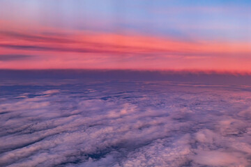 Aerial View Above Clouds At Sunset - 733715937