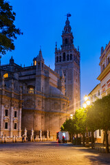 Seville Cathedral And Giralda Tower At Night In Spain