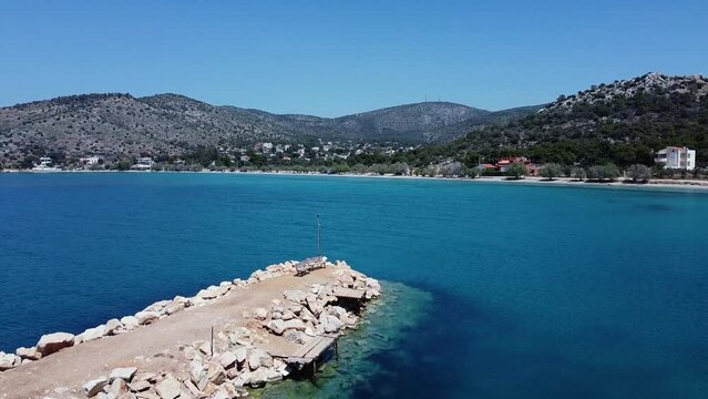 Small fishboat port in a greek village aerial footage