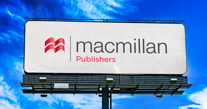 Advertisement billboard displaying logo of Macmillan Publishers