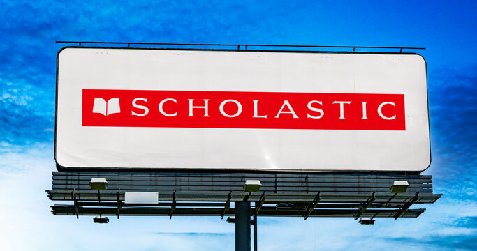 Advertisement billboard displaying logo of Scholastic Corp.