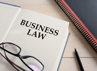 Business law book on the office desk.