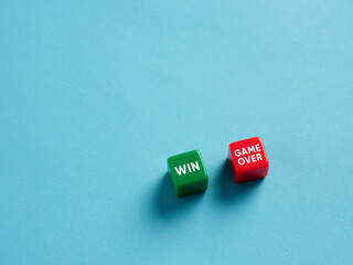 The choice or dilemma between the options of to win vs. game over.