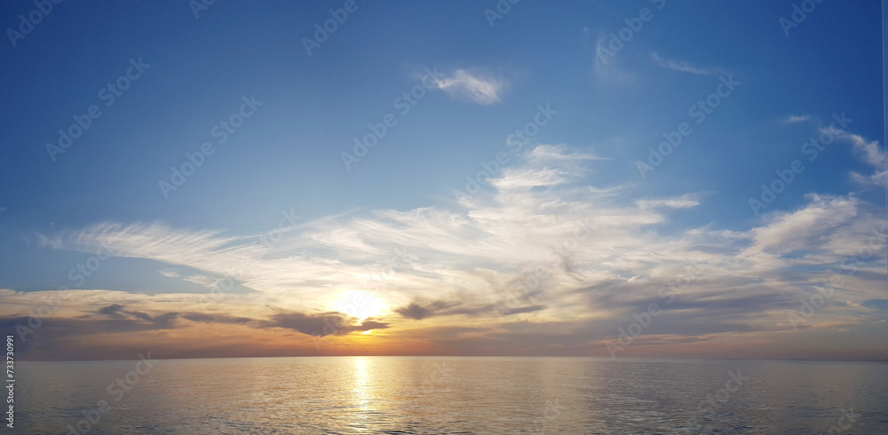 Wall mural sunset sky with cloud and sea, nature background