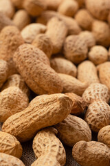 Dried peanuts in close-up. Peanut food background