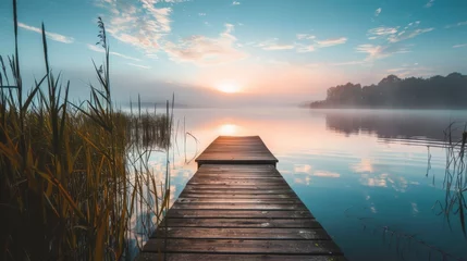 Muurstickers sunrise over the lake © Tejay