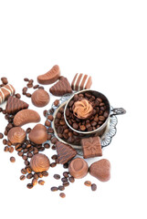 assorted chocolate candies, Cup and coffee beans isolated on white background close up. set of tasty milk fine chocolate. Top view. element for design