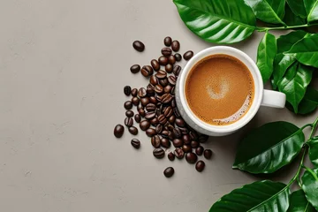 Fotobehang White mockup mug with coffee beans and leaves, top view, flat lay. Coffee mug for logo, design or text © Tisha