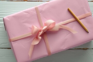 Pink gift package with ribbon, feminine gift mockup for Valentines day sticker, label, logo design presentation.