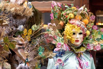 Fotobehang Carnaval Venice, Italy - February 2024 - carnival masks are photographed with tourists in San Marco square  © Renato68