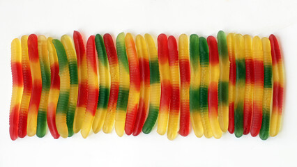 Jelly colored worms, healthy marmalade, top view
