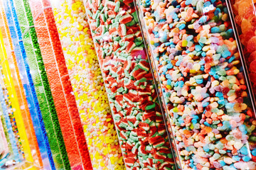 Candy store background. Candies container. Various types of sweets. Gummy bears collection. Kinds paradise background. Sugar snack. Group of jelly.