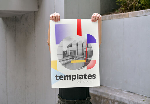 Mockup of woman holding customizable poster, A2 vertical