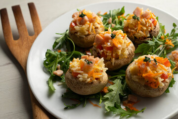 Mushrooms stuffed with rice salad with turkey and vegetables.