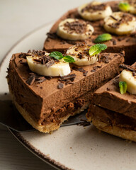 Delicious and fluffy chocolate mousse cake with banana and orange aroma.