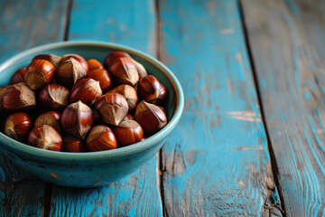 Blue Bowl Filled With Nuts on Wooden Table
