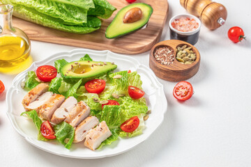 Salad chicken breast fillet and fresh vegetable lettuce, avocado and tomato