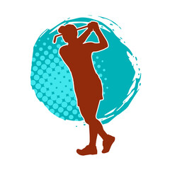 Silhouette of a woman playing golf. Silhouette of a female golfer in action pose.
