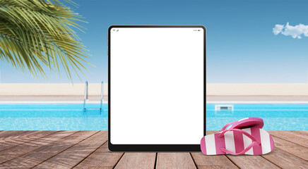 Blank digital tablet at the tropical resort