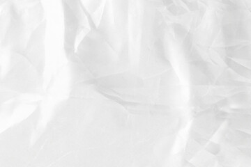 Black wrinkled material with wrinkles and contrasting texture