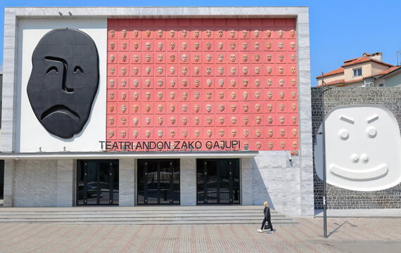 Facade of the Teatri Andon Zako Cajupi decorated with the masks of Tragedy and Comedy and 160 more as the audience. Korca-Albania-249