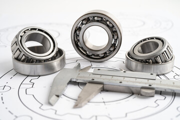 Engineering tools and mechanical industrial with vernier caliper and metal ball bering.