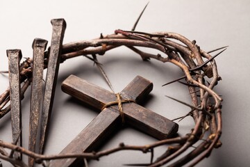 Christian cross and crown of thorns. Easter concept.