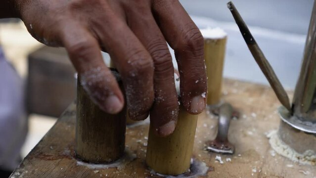 Kue putu or putu bambu, putu buluh or puto bumbongis a traditional cylindrical shaped and green colored steamed cake. Putu cake cooking tools