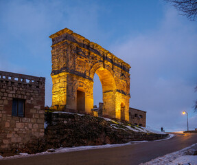 Roman arch of Medinaceli at sunset. Soria, Castilla y Leon, Spain. - 733795102