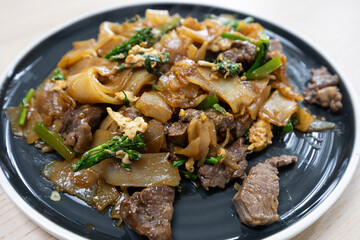 Close-up view of beef pad see ew.