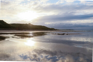 Obraz premium sandy coast at the beach in a sunrise