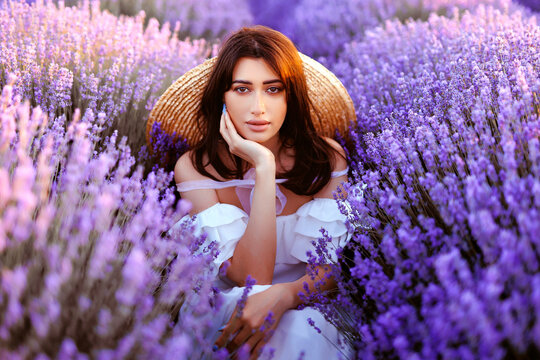 Beautiful girl on the lavender field.
