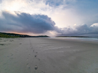 Dramatic clouds above Narin Strand, a beautiful large blue flag beach in Portnoo, County Donegal - Ireland.