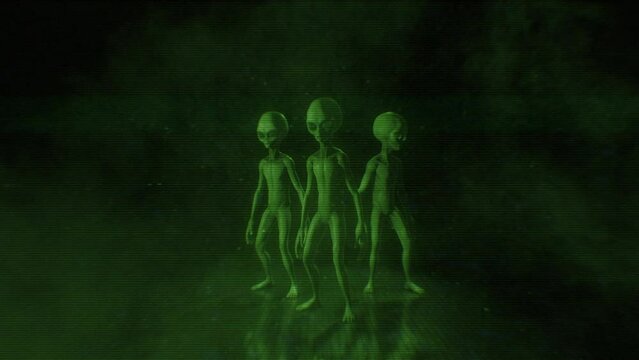 Three Alien Greys are stood together looking around in a darkly lit atmospheric environment