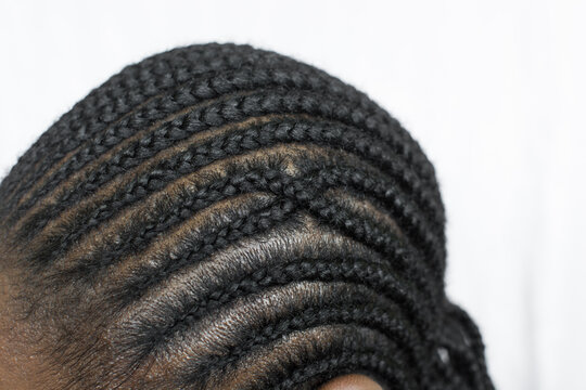 Brown skin woman with straight back cornrows, cornrow braids on brown skin, african american woman with cornrowed hair
