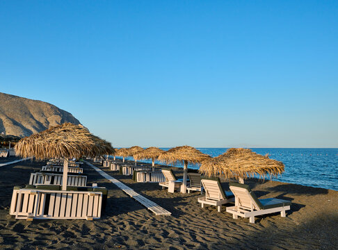 Perivolos beach is a characteristic beach of black sand and small dark pebbles, located in the southern part of the island of Santorini. Greek Islands, Santorini, European Vacation.