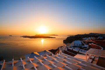 View of the Caldera area of Santorini as the sun sets over the horizon. Photo taken from the...