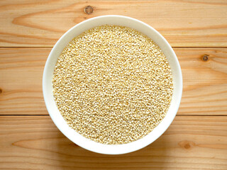 A bowl of uncooked white quinoa
