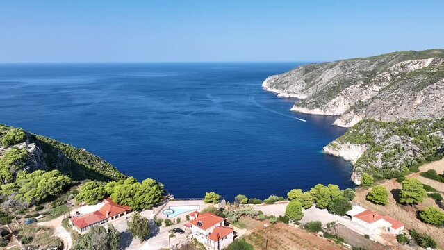 Drone viewpoint of Cliffs of Kambi in Zakinthos Greece Island. Beautiful cliff coast on greek island. Wild cliffs of the western Zakynthos. Vacation turquoise sea and green rock cliffs on the island. 