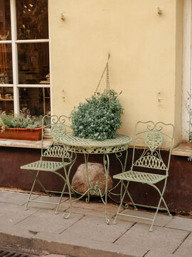 Wrought iron outdoor furniture on the street of the old city