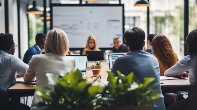 
Corporate meeting of IT industry employees who talk about new projects and the direction of company development