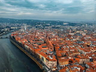 Aerial Photography of Verona city. Urban skyline, historical city centre, red tiled roofs, Veneto...
