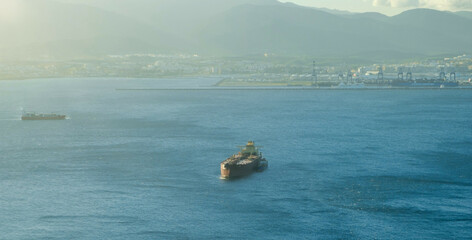 Large Cargo Ship Navigating Vast Ocean Waters