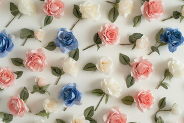 A Tabletop Display of Pink, White, and Blue Roses