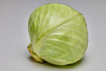 Fototapeta premium a whole green cabbage on a table.