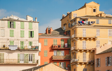 Corsica, Bastia view of old town typical french facade of houses in Porto Vecchio on bright sunny morning, Corsica island, France. - 733868919