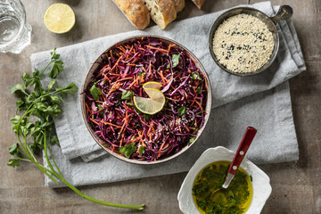 Healthy salad of red cabbage, carrots, coriander and sesame - Top of view.  Healthy eating, vegan...